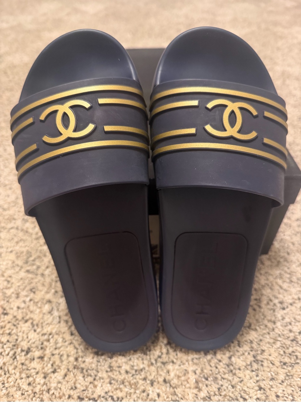 CHANEL Navy Slides with Gold CC Stripes